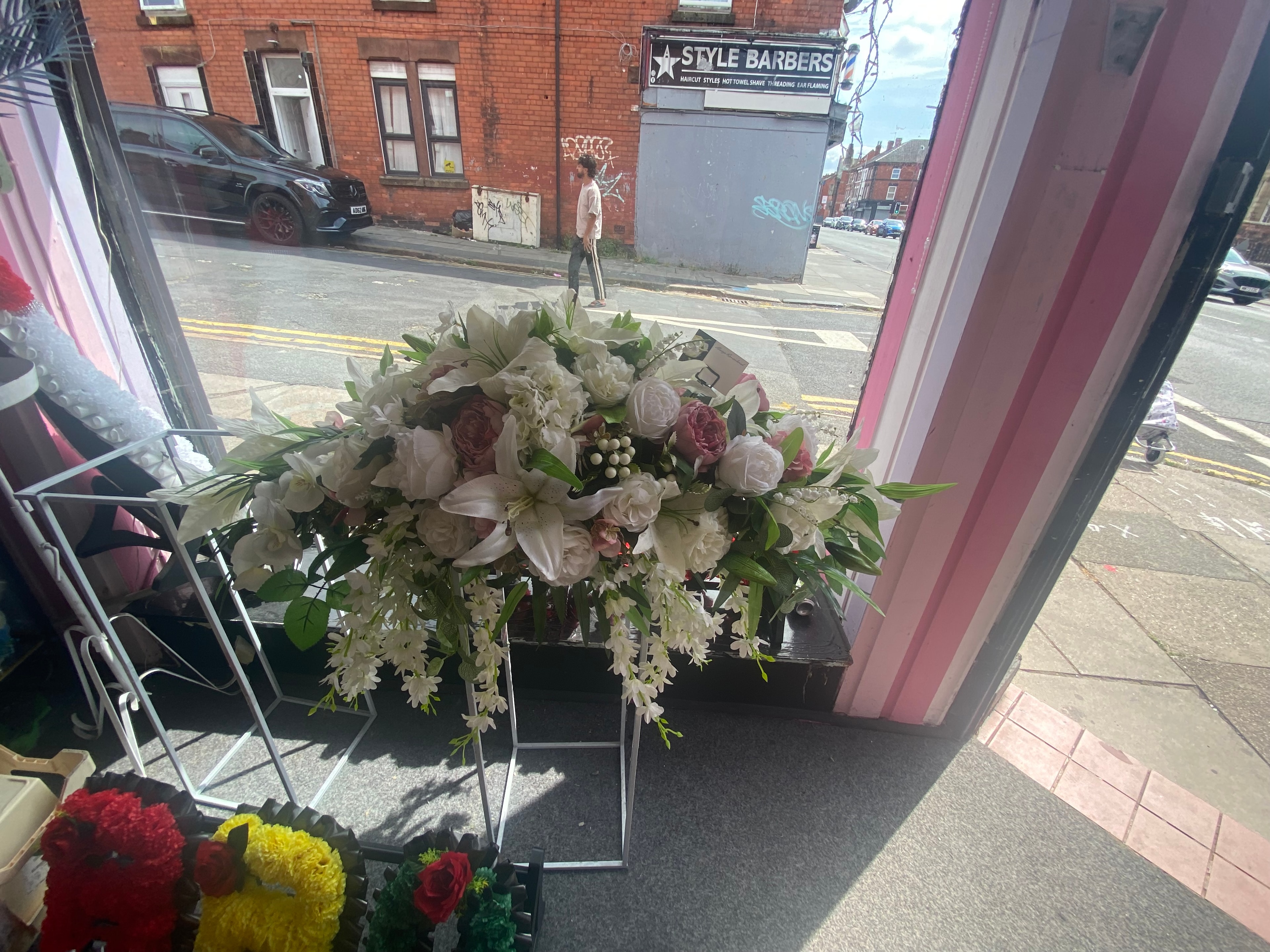 Elegant floral arrangement storefront display